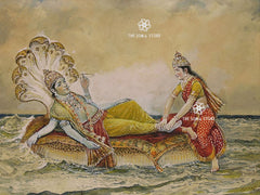 A vintage-style painting depicting a reclining figure on a decorated cushion in the water, with another figure kneeling beside them. The scene has a warm beige sky and ocean, with ornate gold, red, and yellow garments.

Sheshashayi - Laxminarayan by M. V. Dhurandhar (18 × 24 in Poster)